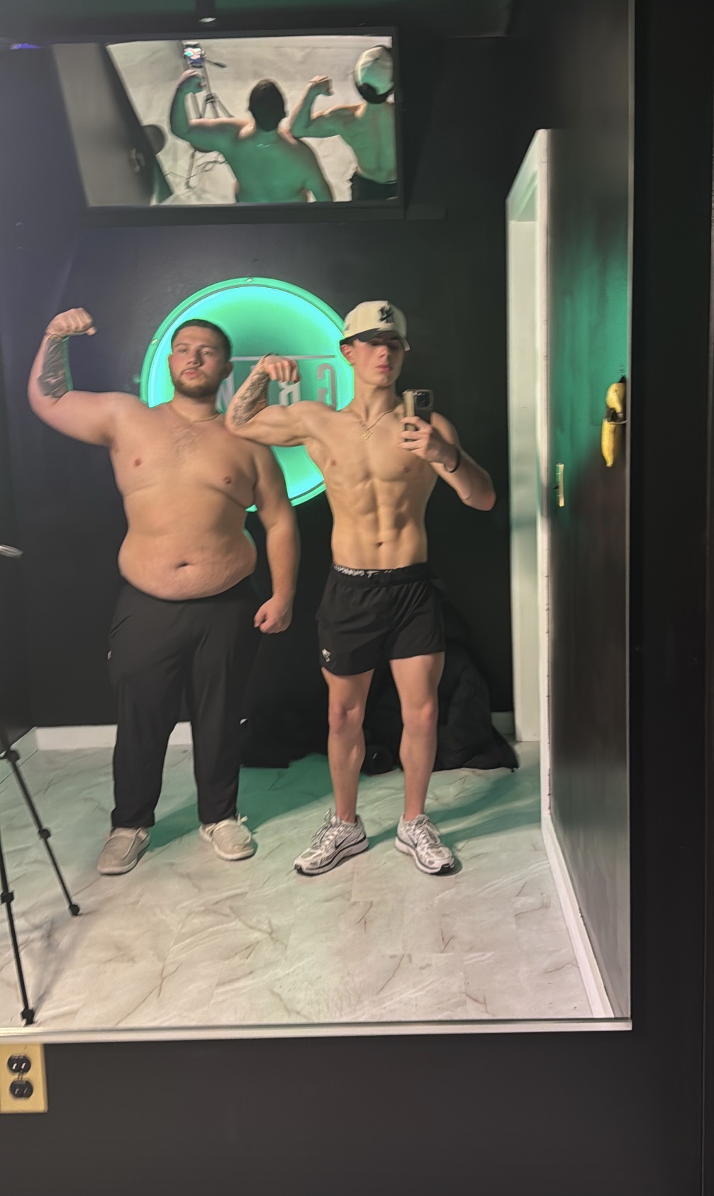 Cole Christian flexing at the gym